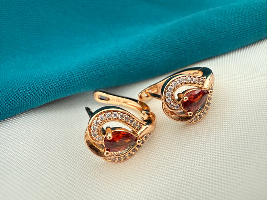 Gold Crescent Hoop Earrings with Red Stone